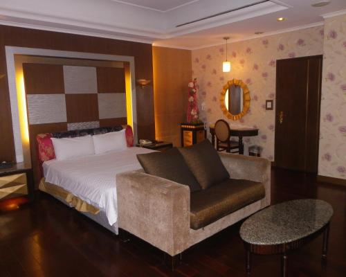 Ein Bett oder Betten in einem Zimmer der Unterkunft Sunflower Motel