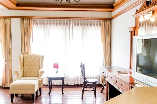 Et tv og/eller underholdning på Sea Garden Resort & Spa, Haadrin