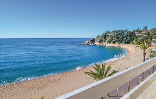 a view of a beach from a balcony at Stunning Apartment In Lloret De Mar in Lloret de Mar