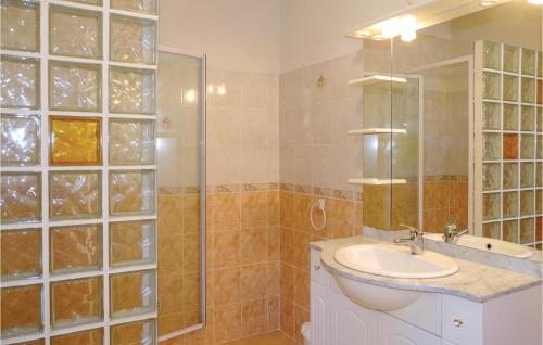 a bathroom with a sink and a shower at Nice Home In Casalabriva With 2 Bedrooms And Wifi in Casalabriva