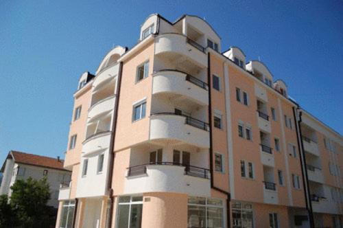 a tall building with at Volkan Apartments in Ohrid