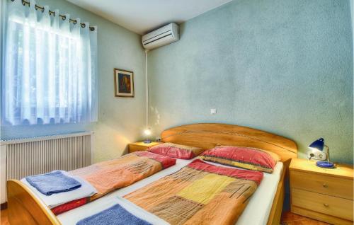Кровать или кровати в номере 3 Bedroom Gorgeous Home In Buje