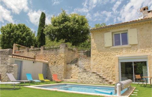 Awesome home in St Restitut with 2 Bedrooms, Private swimming pool and Outdoor swimming pool