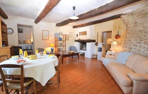 a living room with a couch and a table at 3 Bedroom Nice Home In Bonnieux in Bonnieux