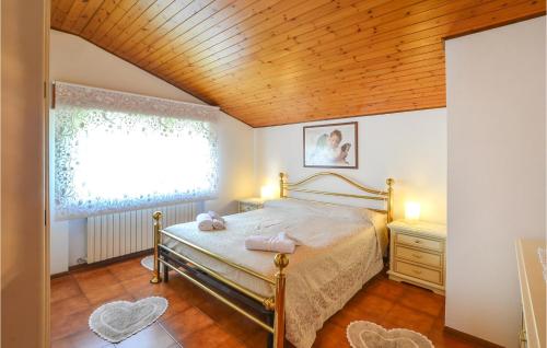 Postel nebo postele na pokoji v ubytování Casa Profumo Di Bosco
