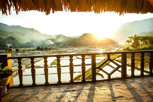 a view from the balcony of a resort at Mai Chau Ecolodge in Mai Chau