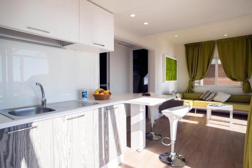a kitchen with a sink and a counter top at Camping Europa in Capoliveri