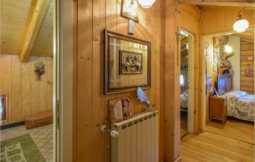 a hallway of a cabin with a room with a bedroom at Amazing Apartment In Borno With Kitchen in Borno