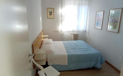 Postel nebo postele na pokoji v ubytování Sogni d'oro a 300 m dai Sassi