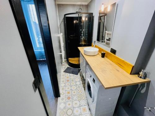 Ένα μπάνιο στο Appartement Calao