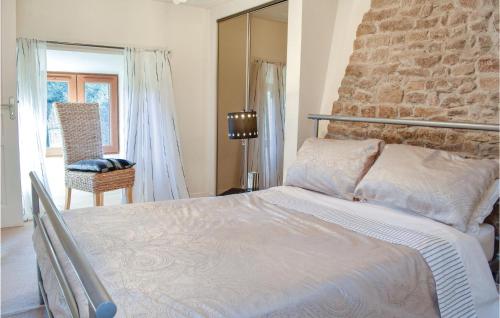 Ένα ή περισσότερα κρεβάτια σε δωμάτιο στο Holiday Home Lieu Dit La Riviere