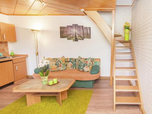 A seating area at holiday home with sauna Thuringian Forest