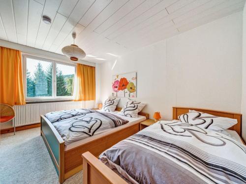 Ένα ή περισσότερα κρεβάτια σε δωμάτιο στο Cozy Apartment Near Trails
