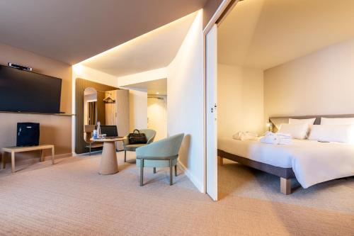 Un ou plusieurs lits dans un hébergement de l'établissement Novotel Paris Orly Rungis Aéroport