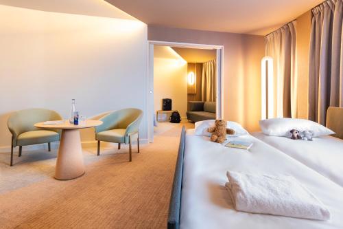 Un ou plusieurs lits dans un hébergement de l'établissement Novotel Paris Orly Rungis Aéroport