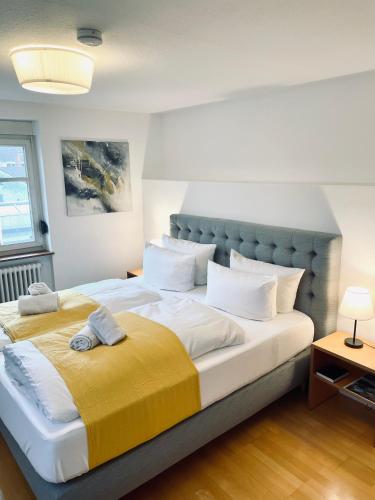 Ένα ή περισσότερα κρεβάτια σε δωμάτιο στο Hotel & Restaurant Grüner Baum Merzhausen