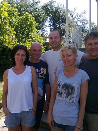 a group of people posing for a picture at Giorgi's Homestay in Kutaisi