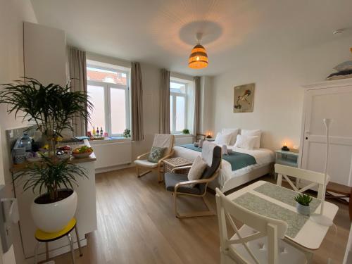 Area soggiorno di LOGIES-M Comfort Studios Inc Bikes B&B