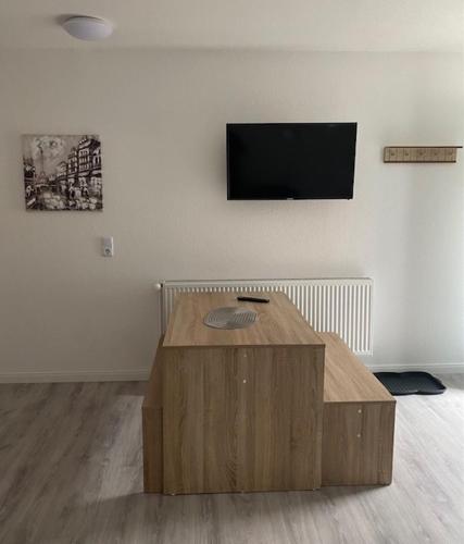 Family Apartments Lübeckにあるテレビまたはエンターテインメントセンター