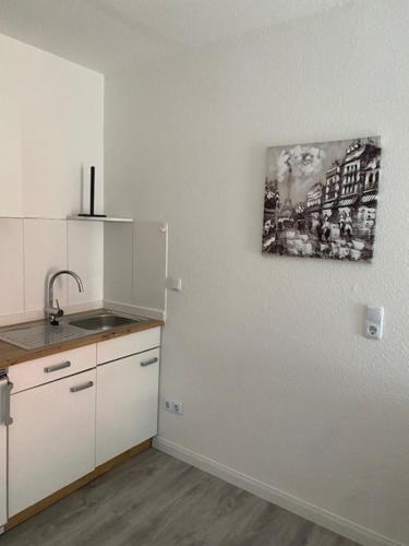 Family Apartments Lübeckにあるキッチンまたは簡易キッチン