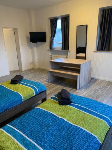 Family Apartments Lübeckにあるベッド