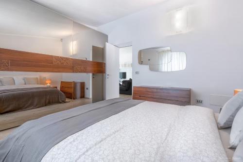 A bed or beds in a room at Villa LUCI' in Puglia, vicina alla VALLE DI ITRIA