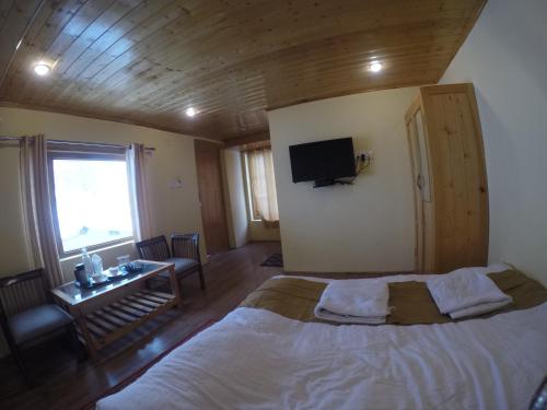 Postel nebo postele na pokoji v ubytování Ashina Eco Resort