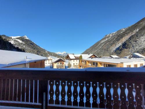 a view from the balcony of a resort with mountains at Gästehaus Sonne in Bichlbach