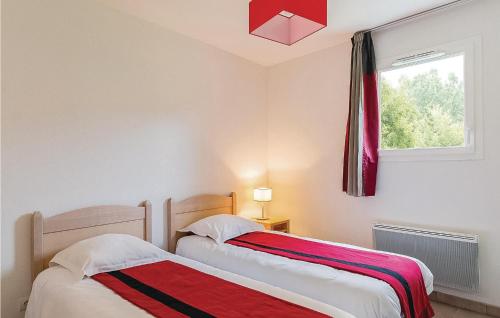 Posteľ alebo postele v izbe v ubytovaní Les Bastides De Lascaux