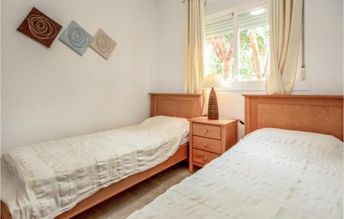 Un pat sau paturi într-o cameră la Casares Del Sol