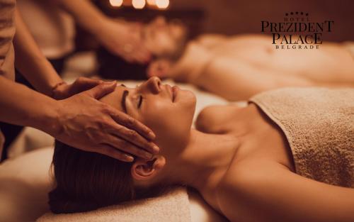 a woman getting a massage at a spa at Prezident Palace Belgrade - Adults Only in Belgrade