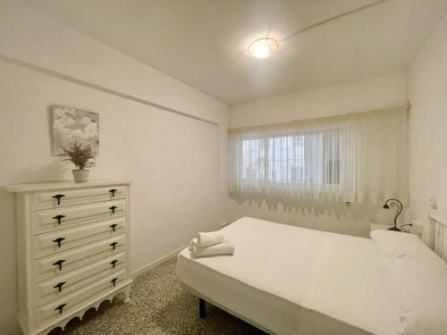 Postel nebo postele na pokoji v ubytování Calle Gambo Apartment