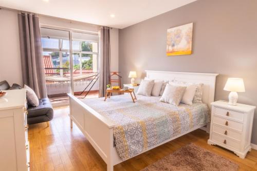 Postel nebo postele na pokoji v ubytování Maria Casa Branca by ALMA Holiday Rentals