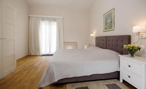 Postel nebo postele na pokoji v ubytování Villa Eol