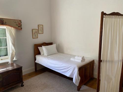 Ένα ή περισσότερα κρεβάτια σε δωμάτιο στο Dwarsvlei Guest Farm
