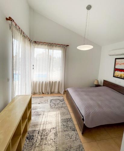 Llit o llits en una habitació de Villa SeaBerry