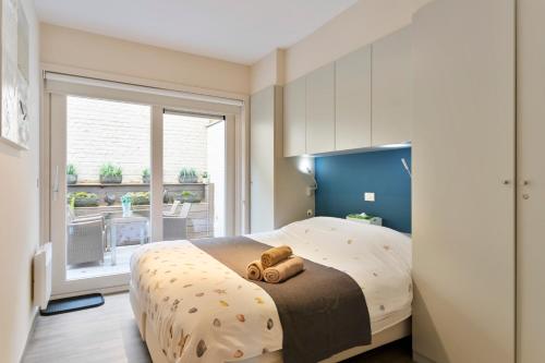 Cama ou camas em um quarto em Flat Sableau
