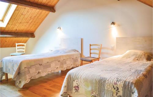 Voodi või voodid majutusasutuse 3 Bedroom Awesome Home In Roisel toas