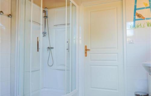 a shower with a glass door in a bathroom at 3 Bedroom Awesome Home In Roisel in Roisel