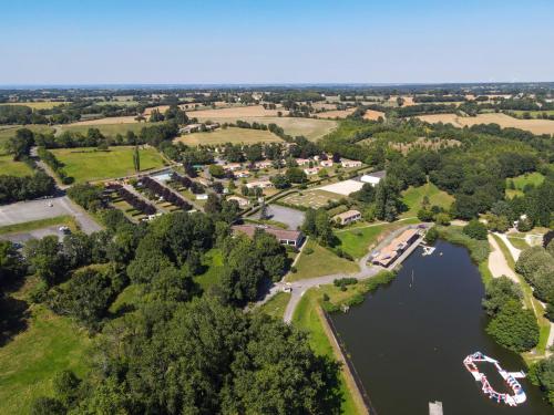 an aerial view of a river with boats in the water at Olydea le Lambon - Prailles-la-Couarde in Prailles