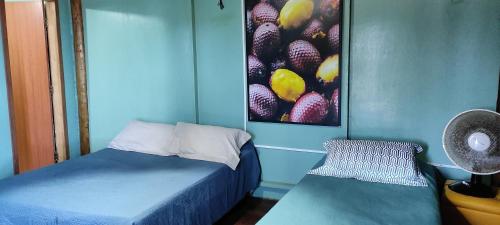 Cama o camas de una habitación en Vereda Tropical Piauí