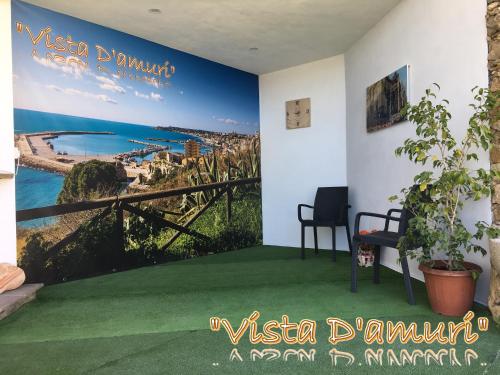 a room with a mural of a view of the ocean at VISTA D'AMURI in Sciacca