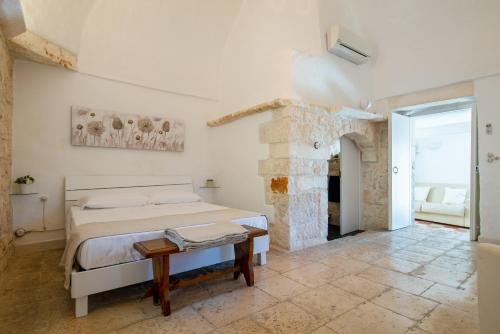 Posteľ alebo postele v izbe v ubytovaní Campanile Apartment with terrace by Wonderful Italy