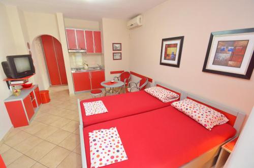 Postel nebo postele na pokoji v ubytování Apartmani Ćetković