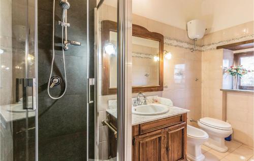a bathroom with a shower and a sink and a toilet at Maurizia in Bagnoregio