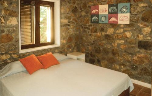 Krevet ili kreveti u jedinici u objektu Cozy Home In Astros Peleponese With Wifi