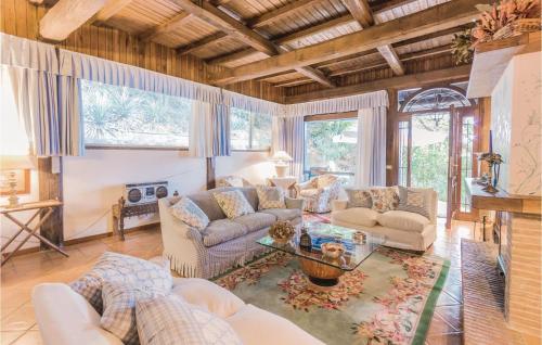 a living room with couches and a table at Carlotta in Grottaferrata