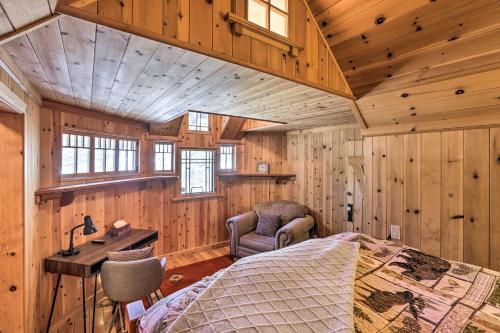 a bedroom in a cabin with a bed and a desk at Tahoe Area Townhome Less Than 1 Mi to Heavenly Lifts! in Stateline