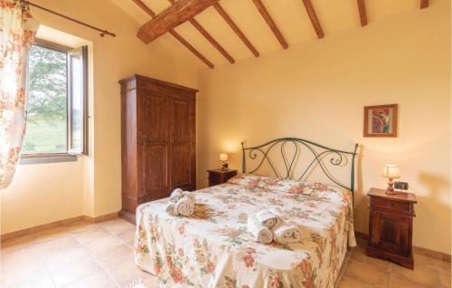 a bedroom with a bed and a window at Ginestre 3 in Mengara