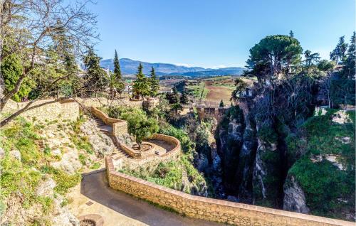 a view from the top of a mountain with a staircase at Awesome Home In Benaoján in Benaoján
